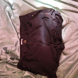Black jean shorts with lace detailing
